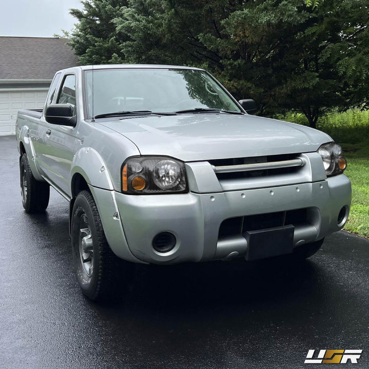 2001 - 2004 Nissan Frontier Black Housing Clear Lens with Amber Reflector Headlights
