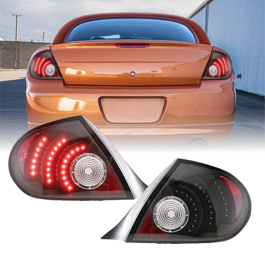 2003 - 2005 Dodge & Plymouth Neon 4D Sedan Black Housing Red LED Clear Lens Tail Light Set